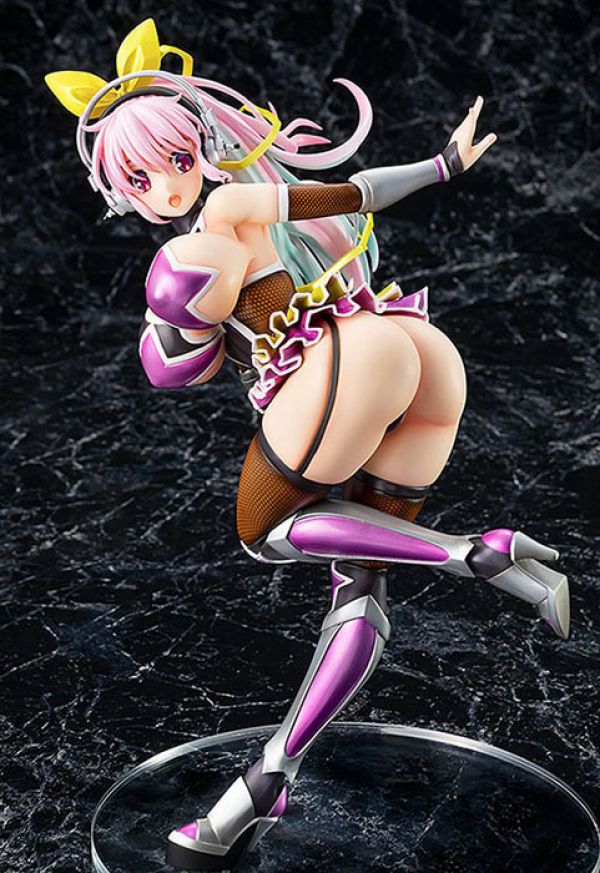 photo of statuette of Super Sonico, purple haired anime style girl with big breasts covered in star shapes that are bouncing in the air while she shows her butt under a frilly skirt in a boobs and butt pose